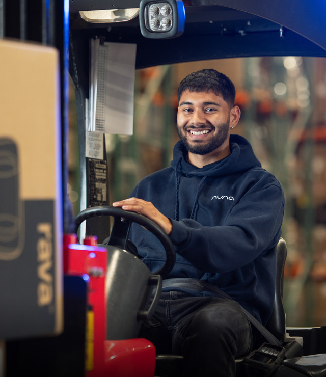 Nuna Values - Employee driving forklift